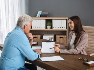 client discussing public adjuster license with advisor