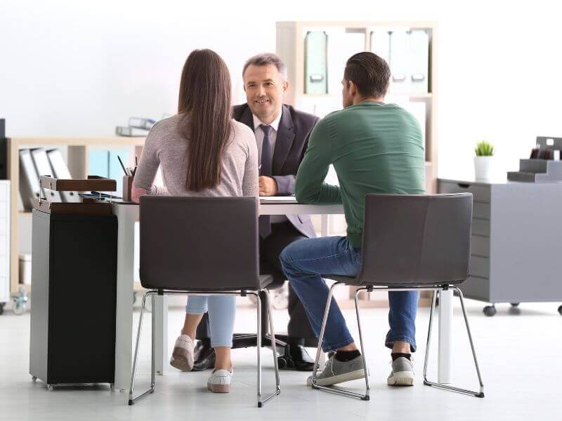public adjuster meeting with clients at the office