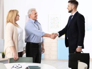 public adjuster finalizing agreement with clients