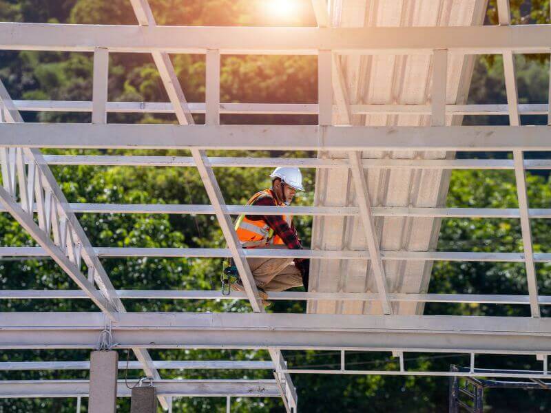 licensed roofer working on construction