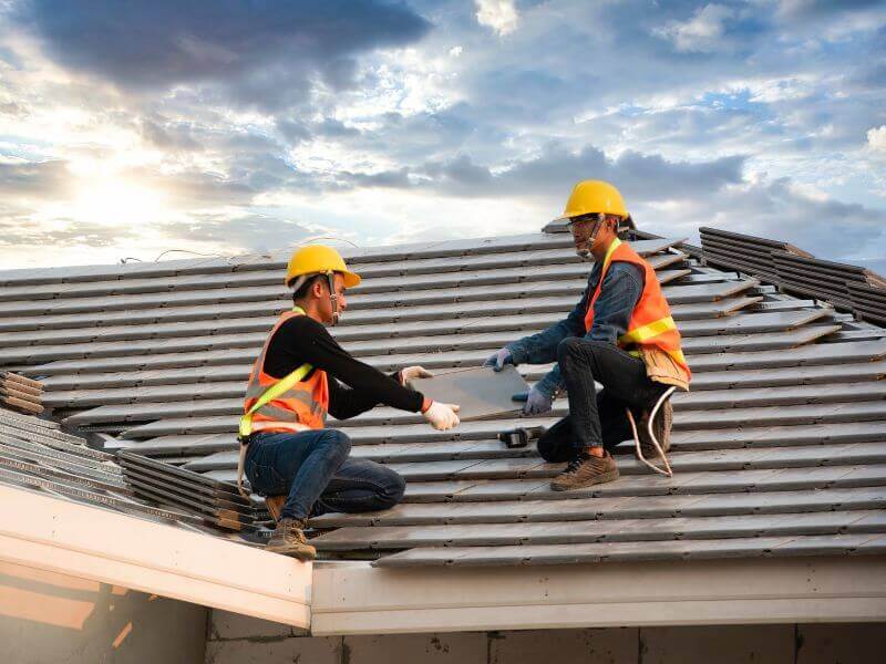 roofers install roof tiles according to roofing standards
