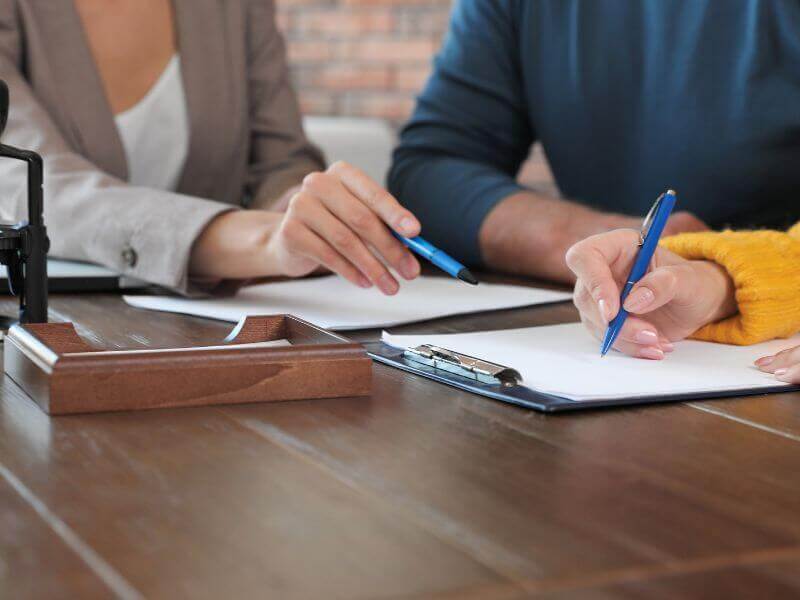 public adjuster helping with insurance paperwork