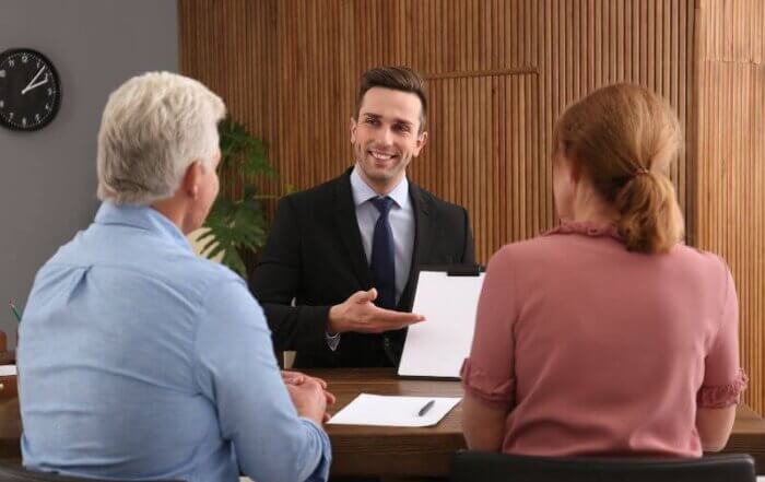 public adjuster explaining claim details to clients