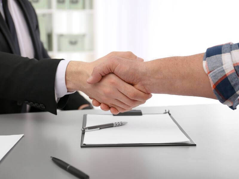 public adjuster and client finalizing claim agreement